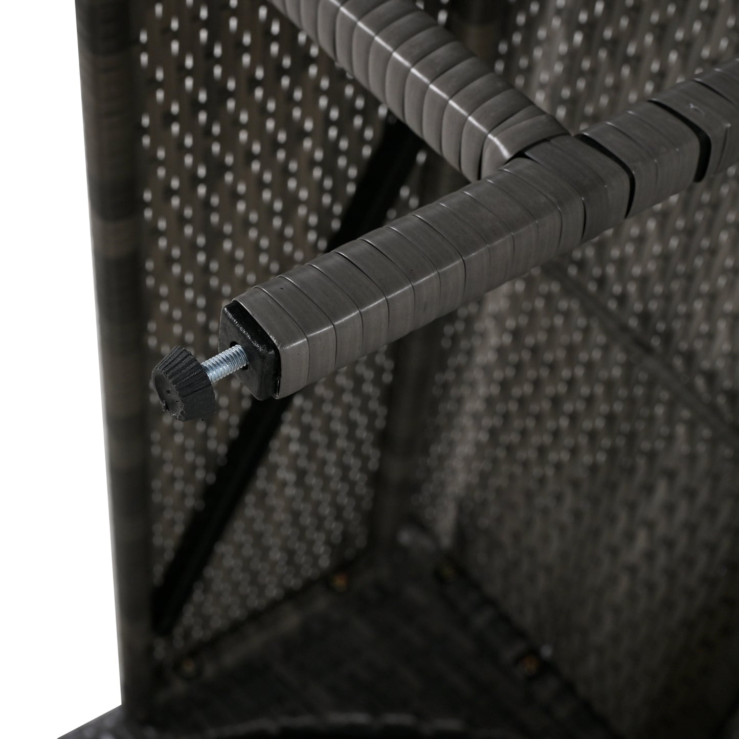 Closeup of a grey rattan furniture leg with adjustable foot for stability
