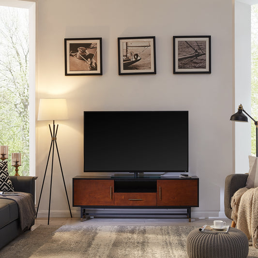 Modern media console in cherry wood finish with black accents and brass handles
