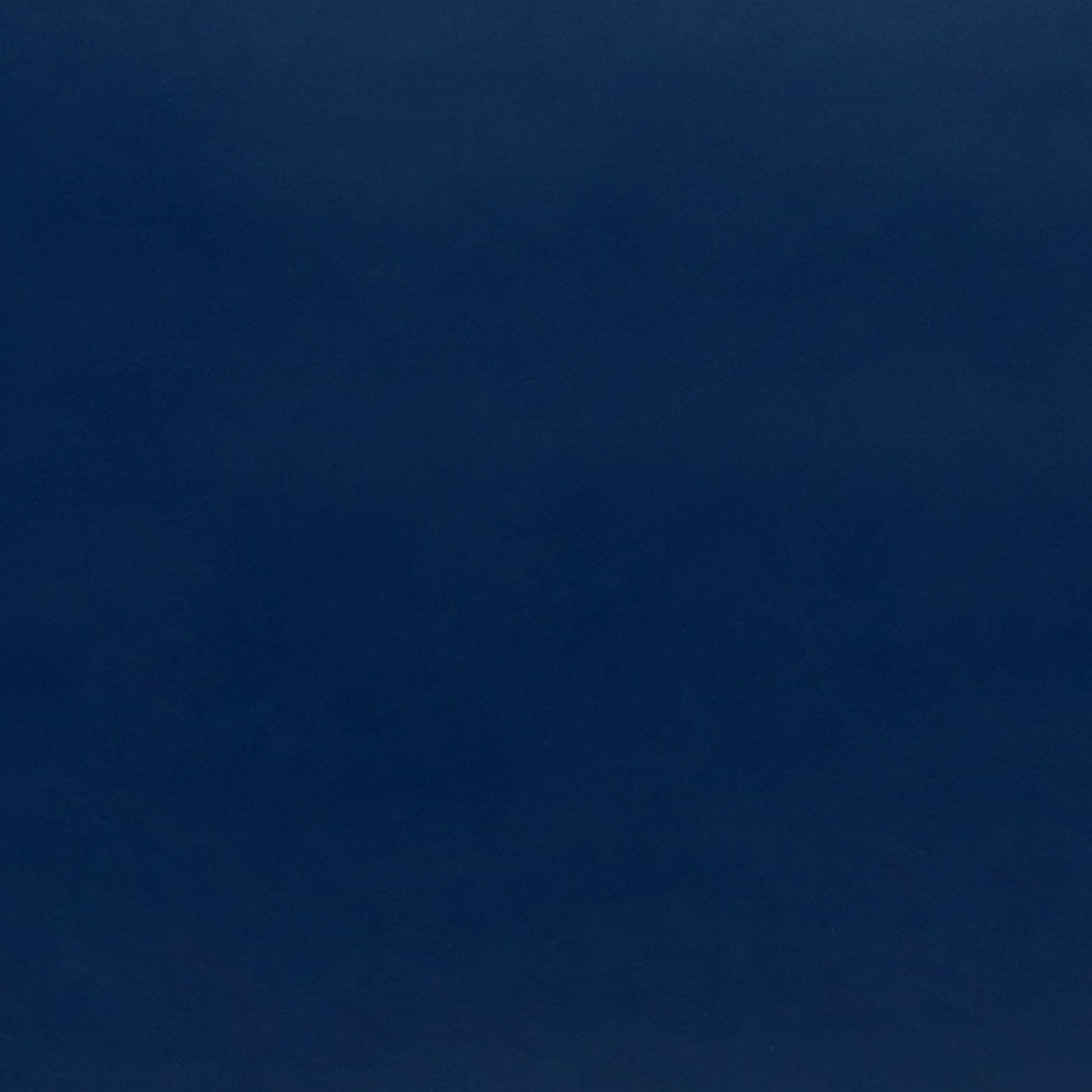 Deep navy blue velvet fabric with a subtle sheen perfect for upholstery projects