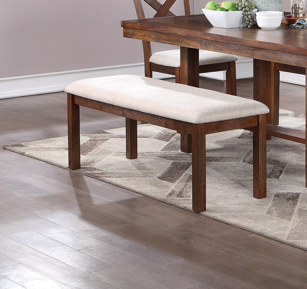 Wooden dining bench with neutral upholstered seat