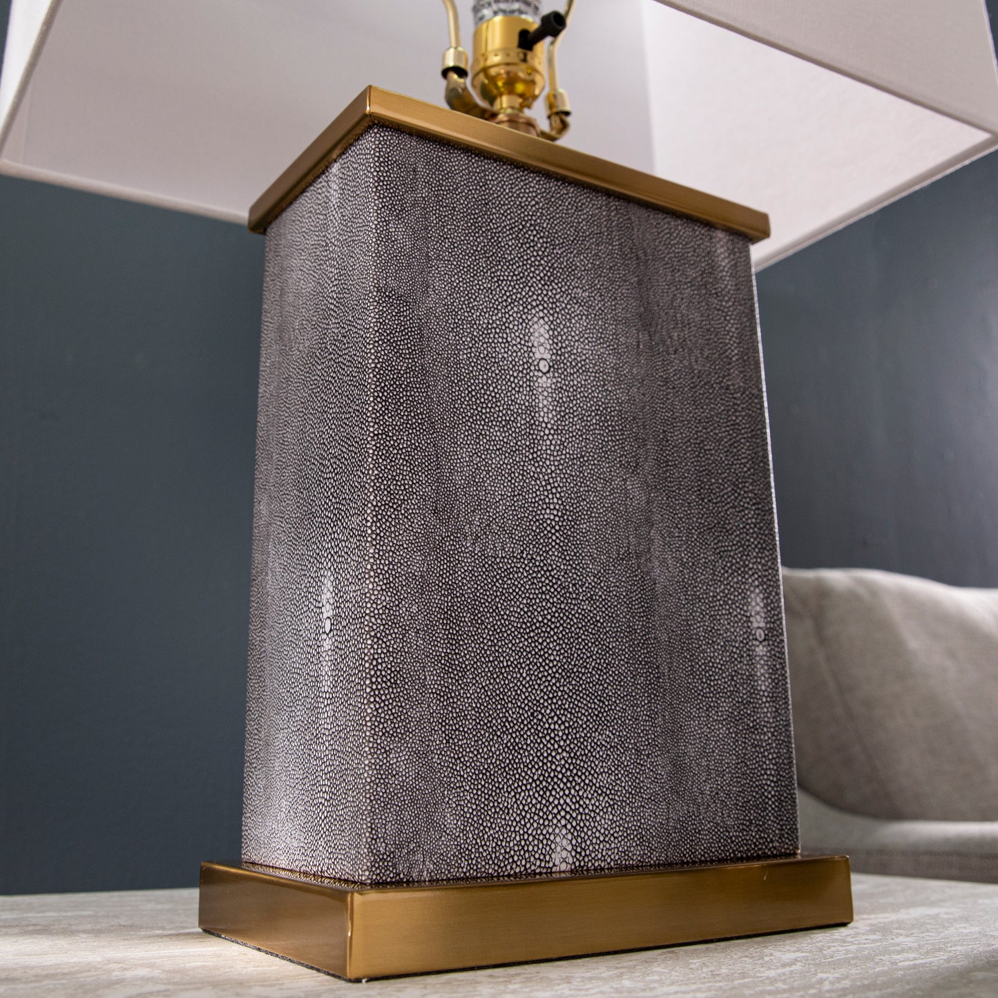 Square gray shagreen table lamp with brass base and white shade