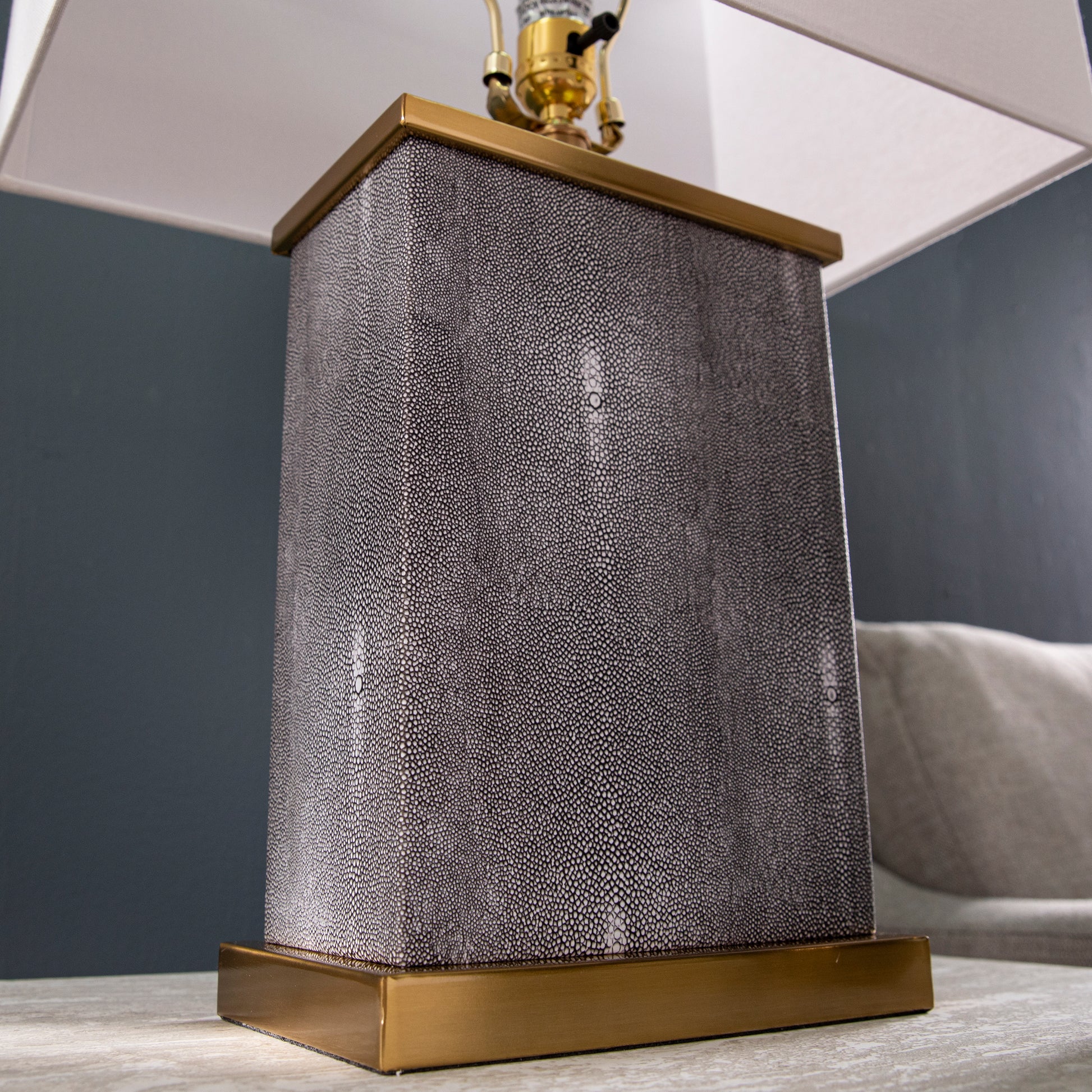 Square gray shagreen table lamp with brass base and white shade