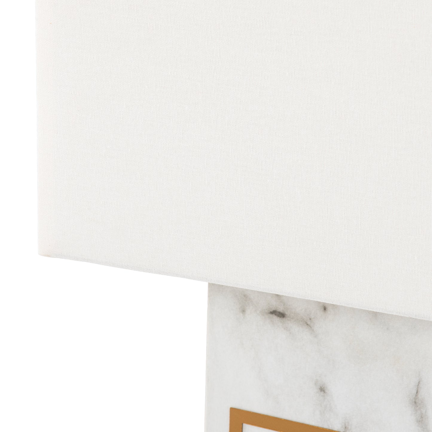 White fabric lampshade with a marble base accented with gold trim