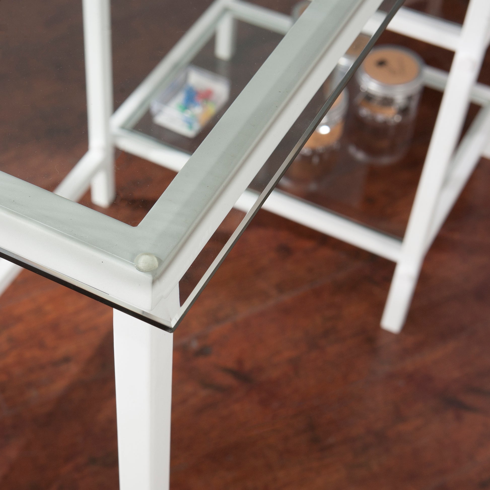 White metal framed glass side table with two shelves