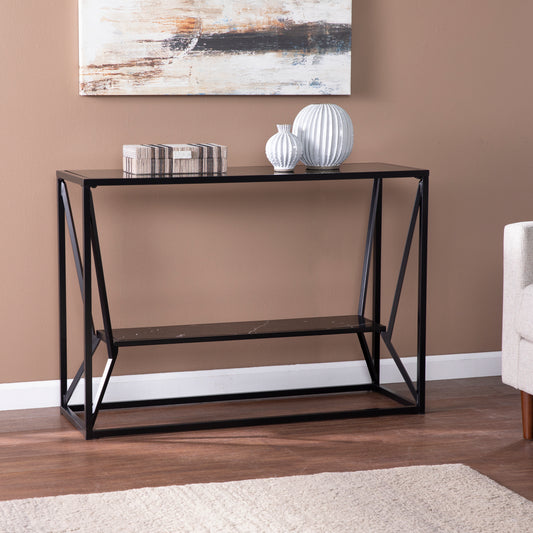 Black metal console table with glass top and faux marble shelf