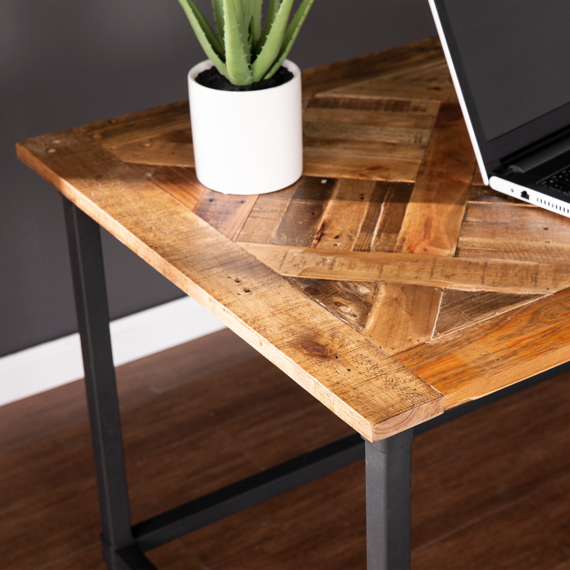Rustic wood side table with a geometric top perfect for a modern living room