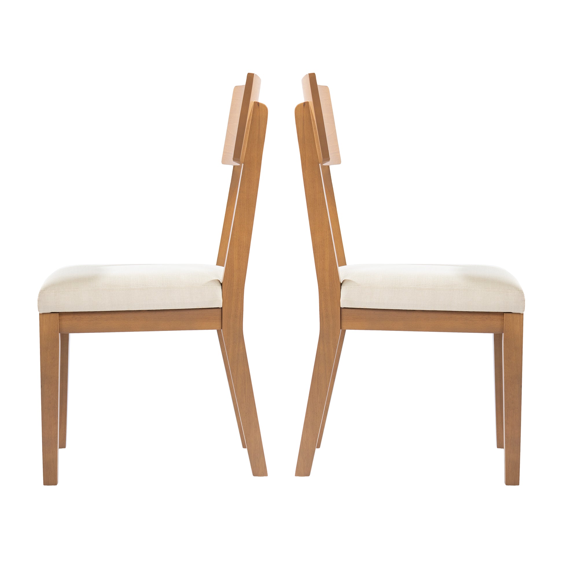 Two identical wooden dining chairs with light cream upholstered seats displayed backtoback