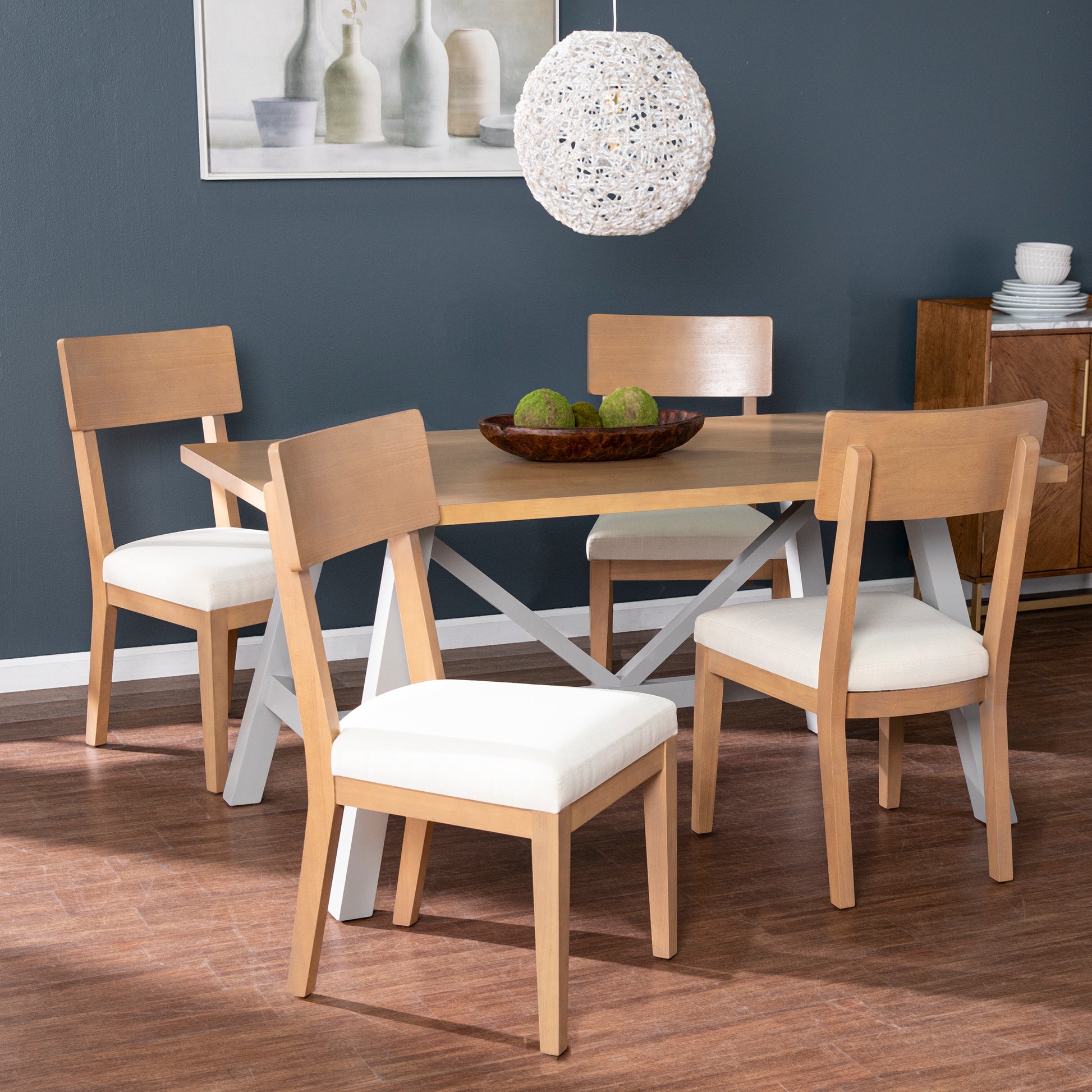 Light wood dining chair with natural grain and beige upholstered seat for modern dining rooms