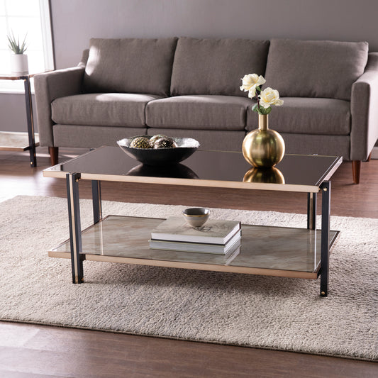 Rectangular black glass coffee table with gold frame and two shelves for living room decor