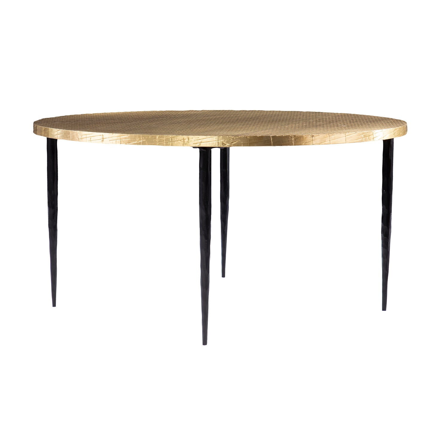 Round brass side table with textured surface and black tapered legs modern design