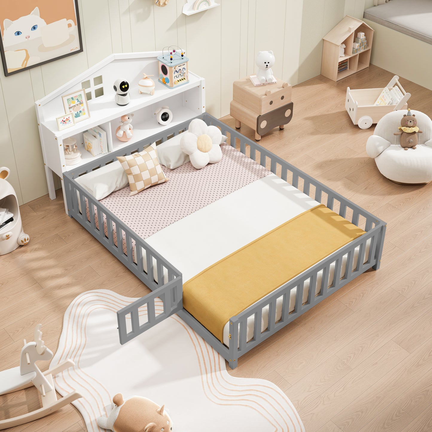Grey wooden toddler bed with a yellow blanket and polka dot sheet