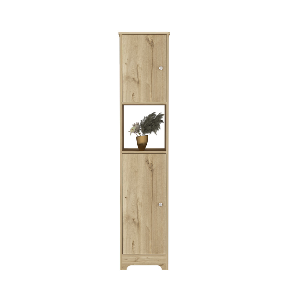 Tall natural wood narrow cabinet with two doors and an open shelf holding decorative grass