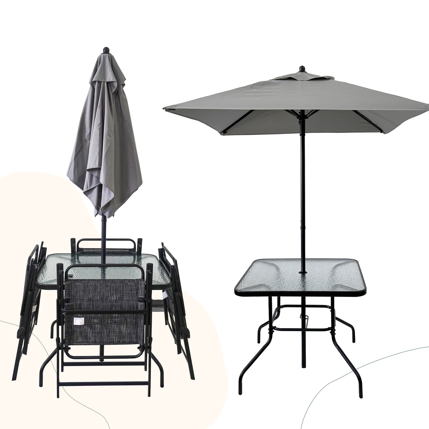 Glass top patio table with grey umbrella and four folding chairs for outdoor dining