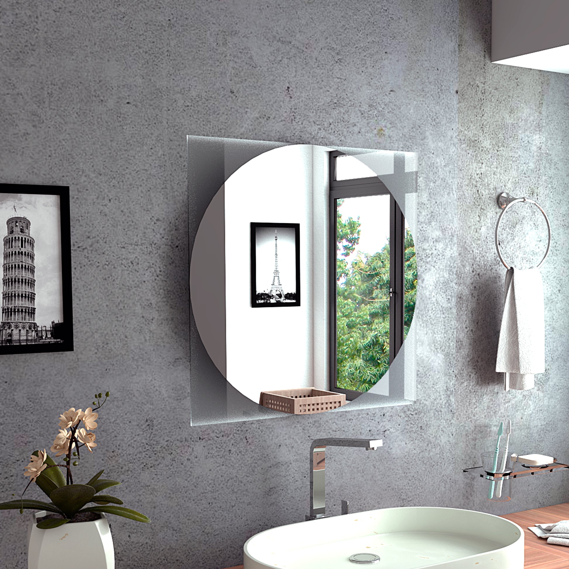 Round bathroom mirror with sleek chrome accents and a towel ring