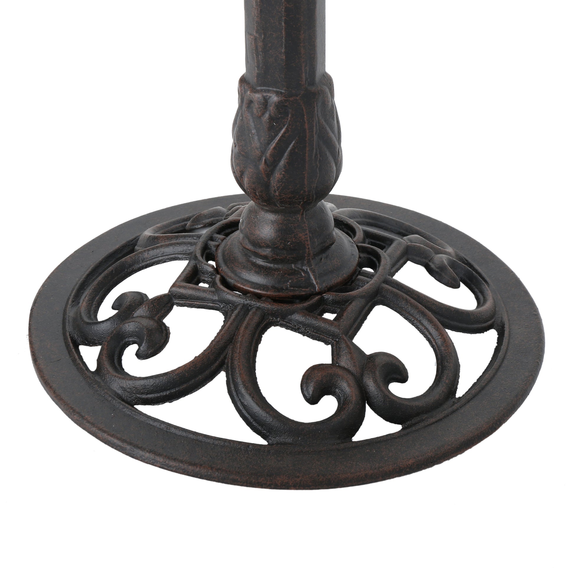 Ornate cast iron table base with decorative scrollwork perfect for outdoor patio furniture