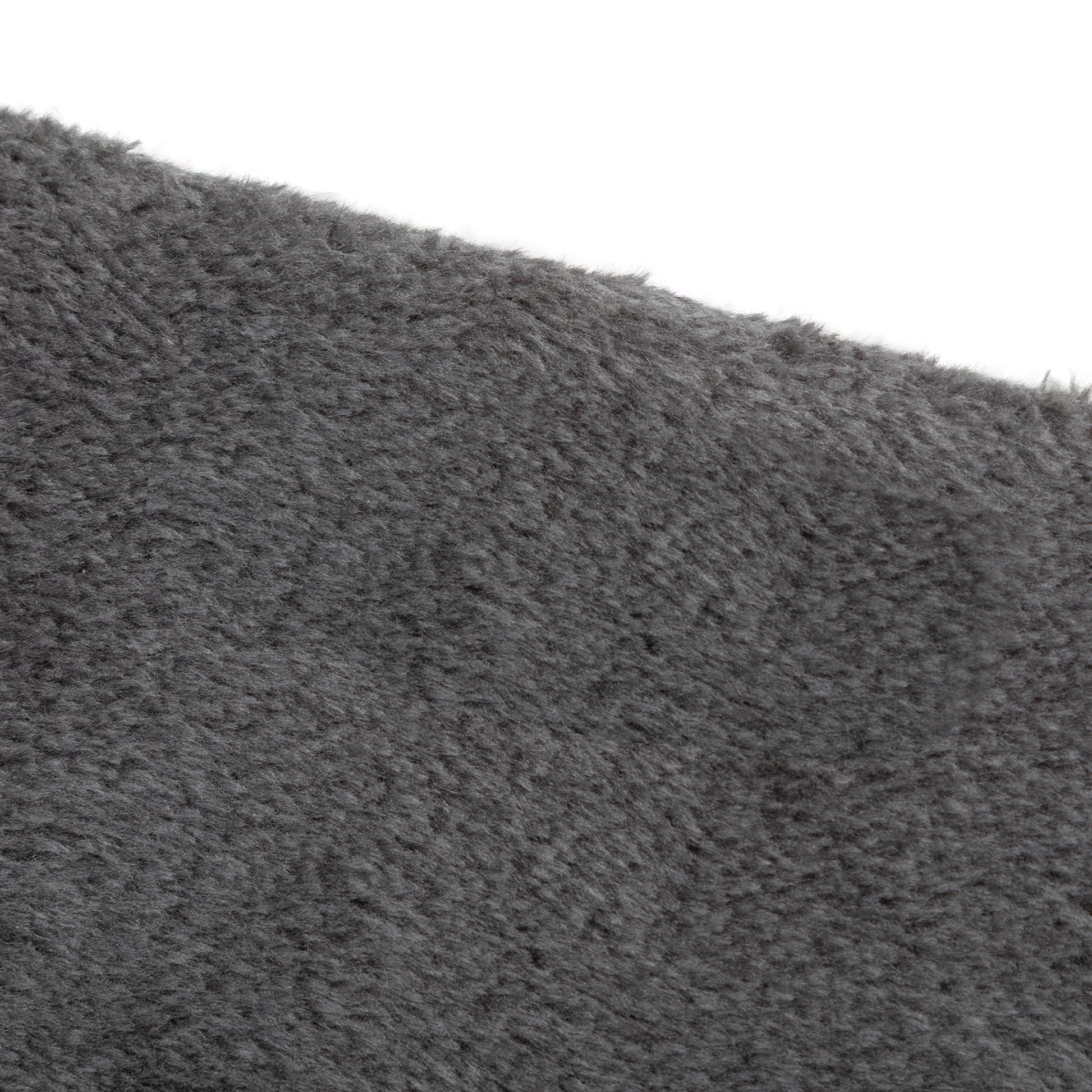 Closeup texture of a dark grey plush fabric ideal for cozy blankets