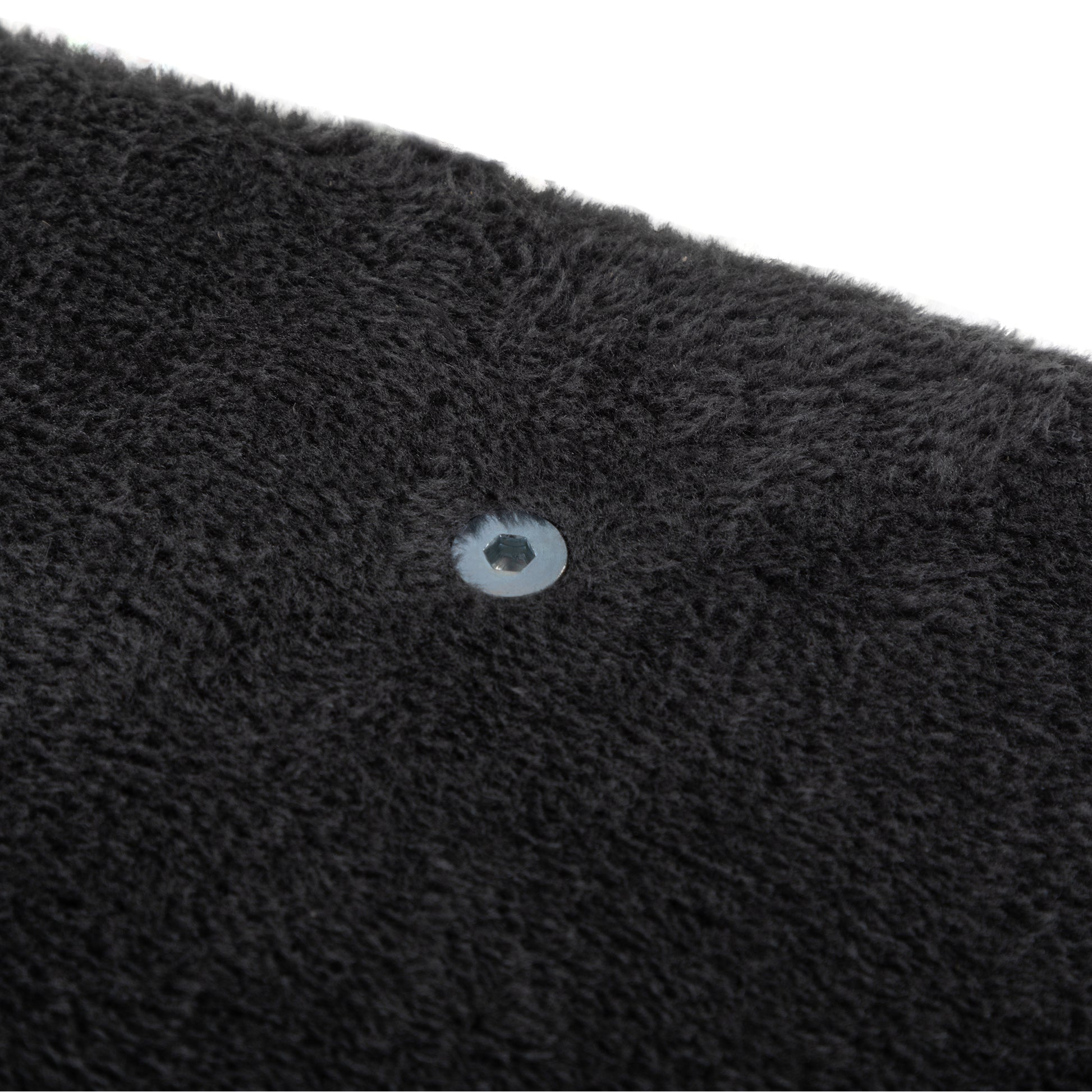Textured dark gray faux fur fabric with a visible silver hex bolt accent