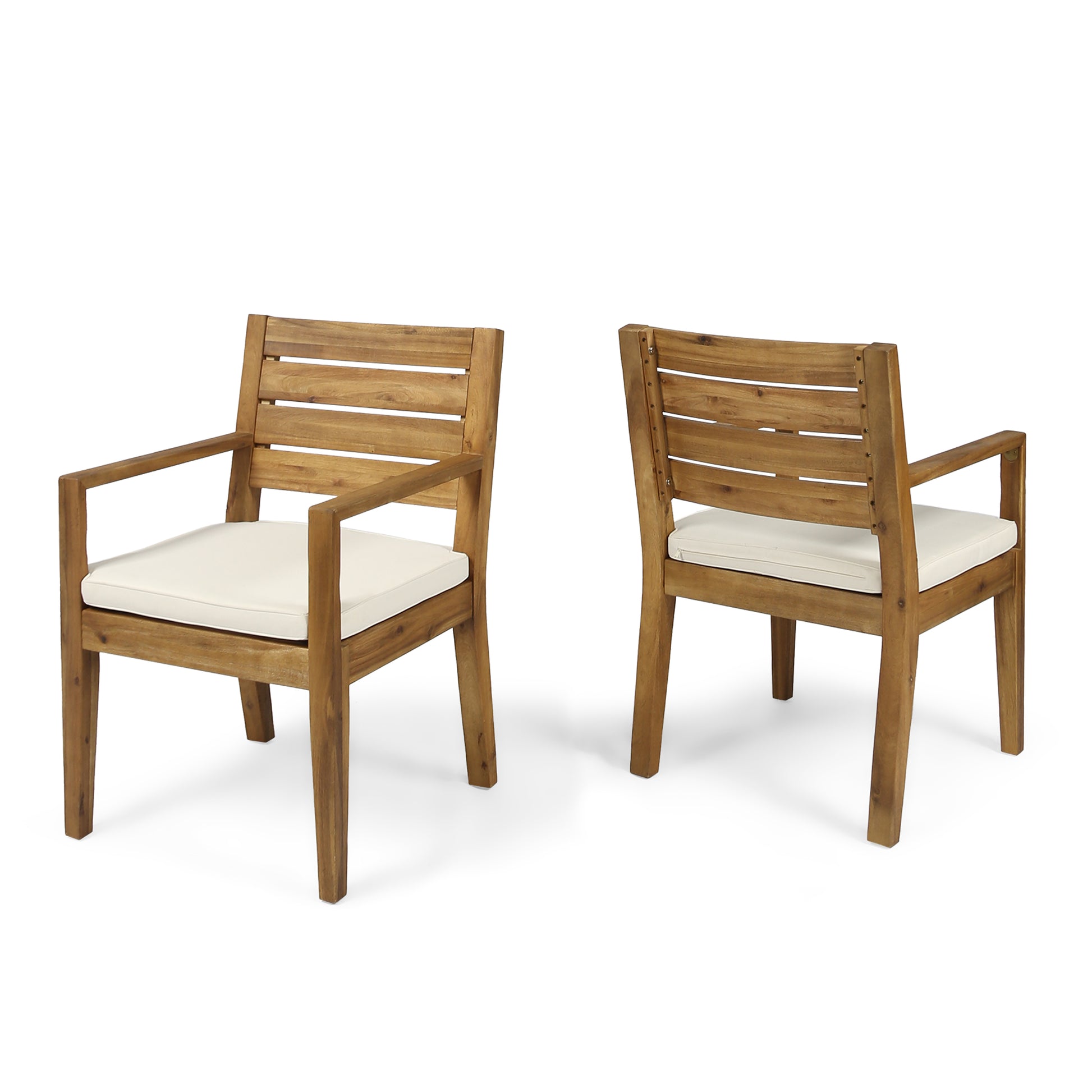 Two natural acacia wood outdoor chairs with white cushions slatted backs and arms