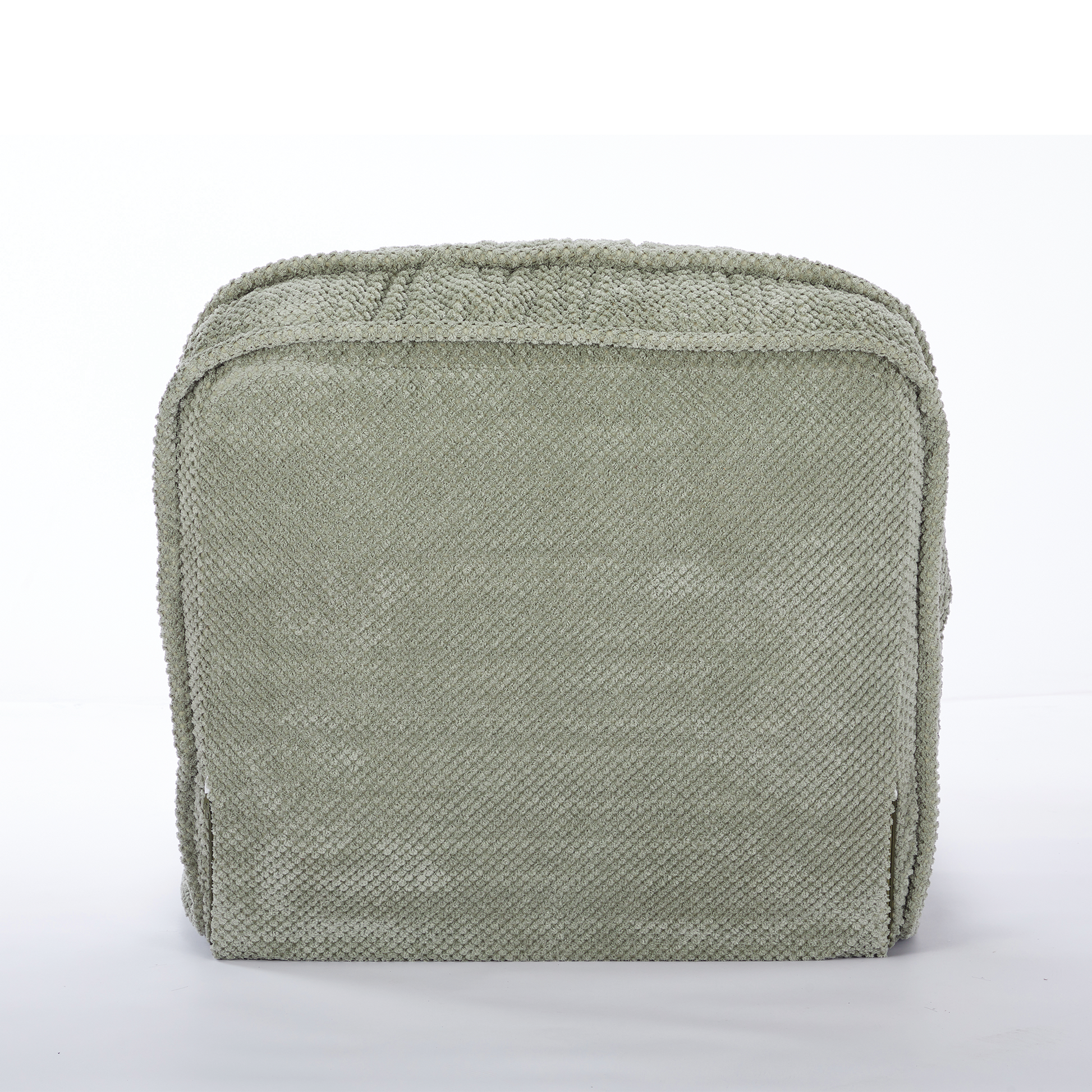 Sage green corduroy ottoman with textured fabric for comfort and style