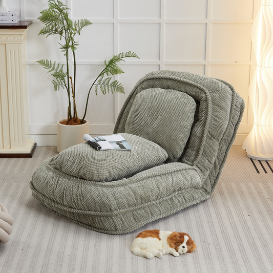 Plush grey floor chair with adjustable backrest perfect for relaxing reading nook