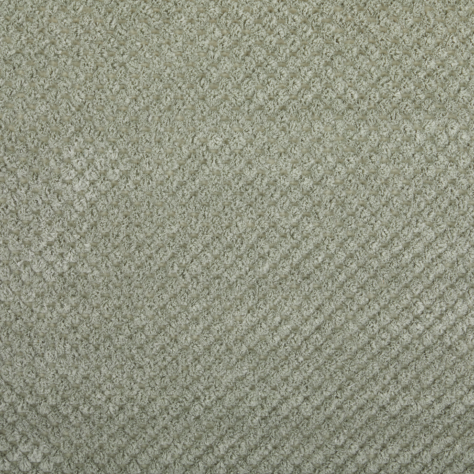 Light grey textured fabric with a chenille weave perfect for upholstery