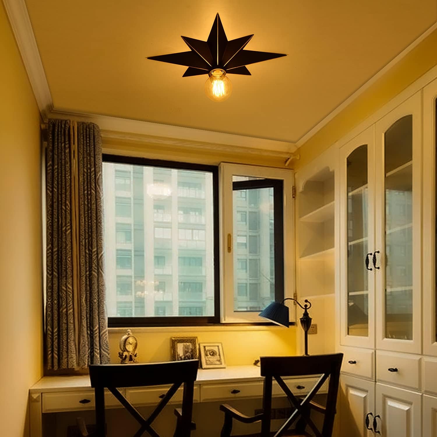 Black starburst flush mount ceiling light with exposed Edison bulb for modern farmhouse decor