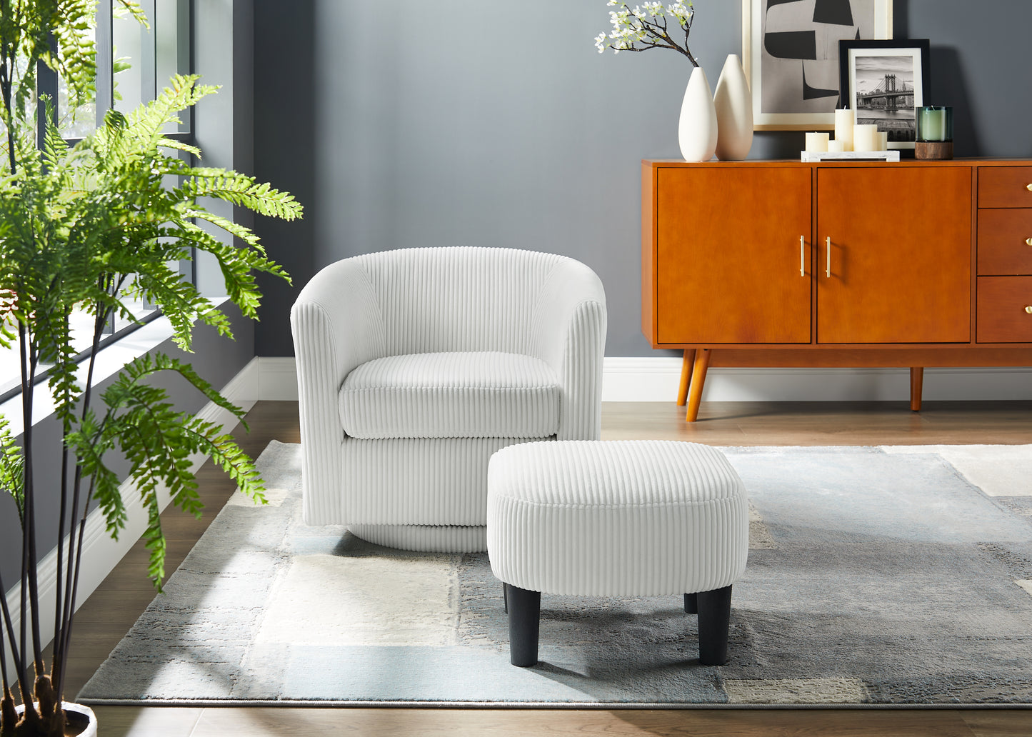 Plush white corduroy swivel armchair with matching ottoman for cozy living spaces