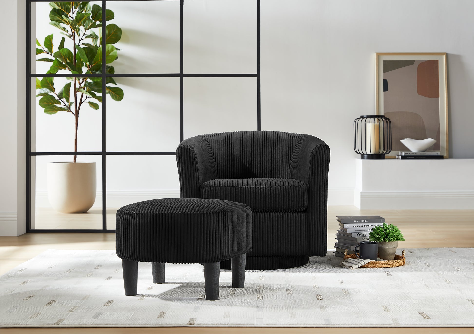 Black corduroy swivel chair and ottoman set with plush texture