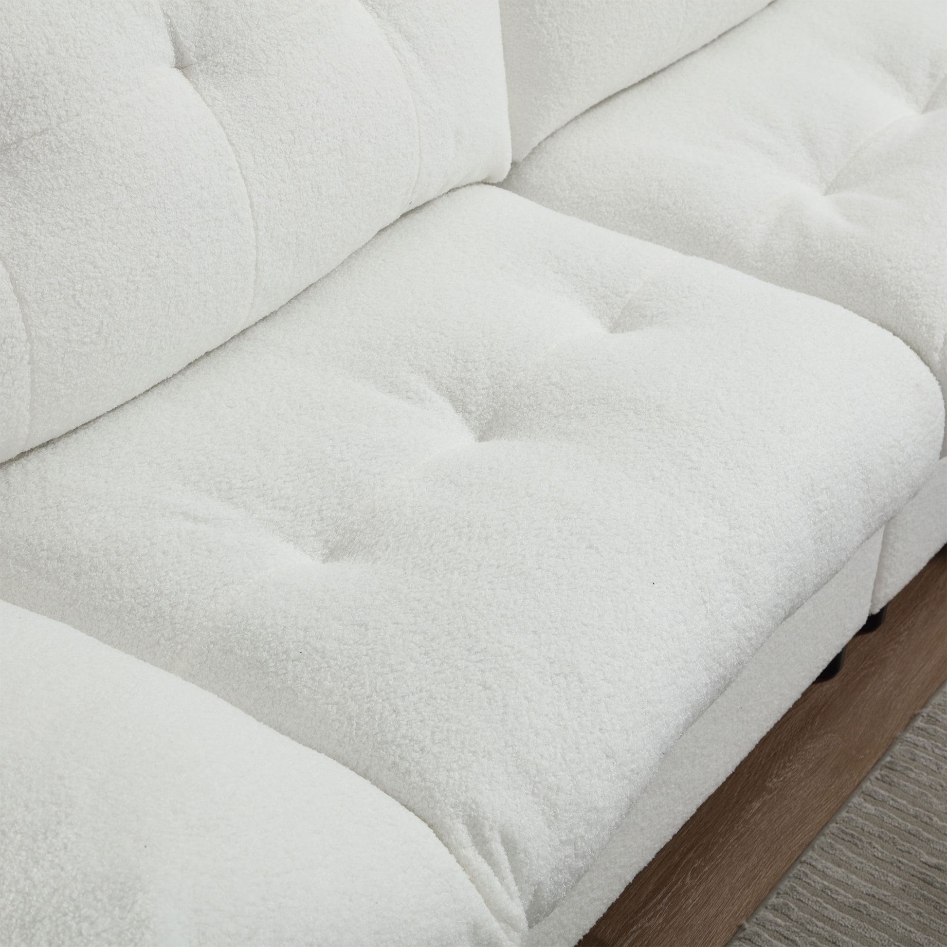 Plush white teddy bear fabric sofa cushions with tufted accents for luxurious comfort