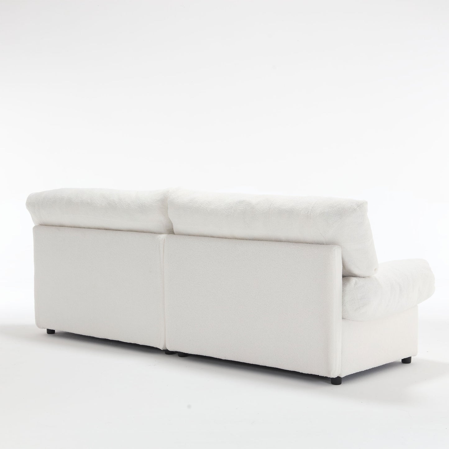 Modern white boucle sofa with plush cushions perfect for a cozy living room setup
