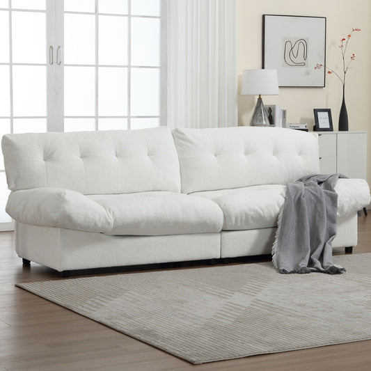 Plush white boucle sofa with deep tufting and comfortable seating for a modern living room