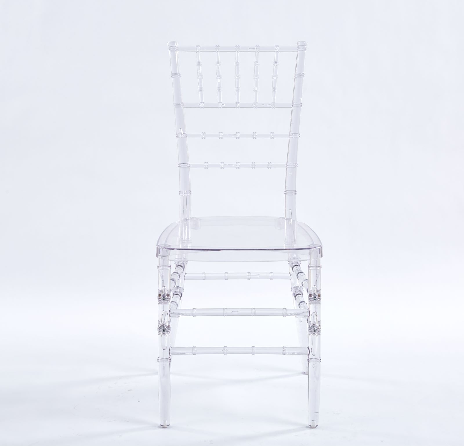 Clear acrylic Chiavari chair with ornate back and legs