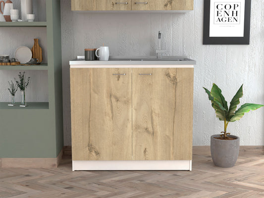 Light oak veneer kitchen base cabinet with silver handles and stainless steel sink