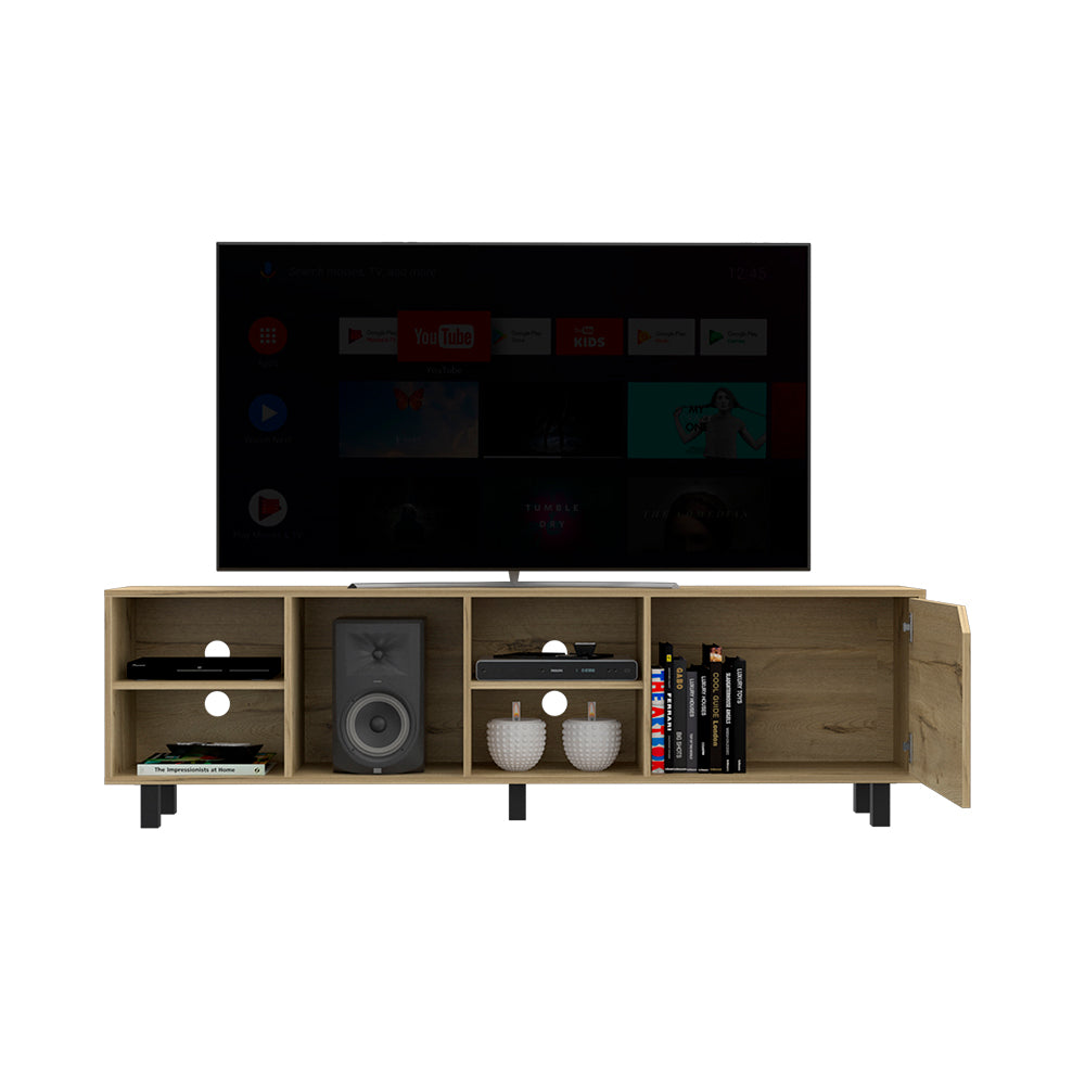 Light oak media console with open shelving holding a speaker books and decor