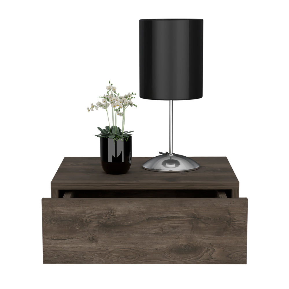 Rustic oak floating nightstand with open drawer black lamp and plant