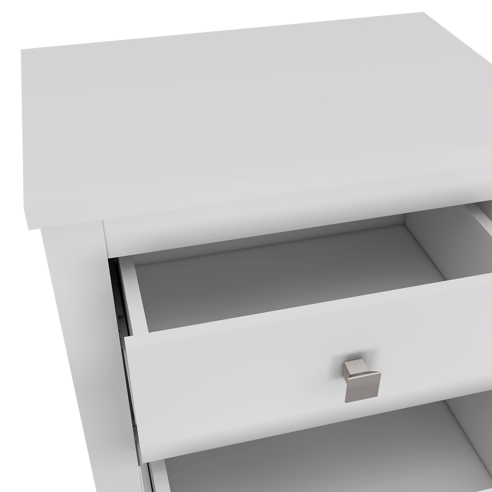 Closeup of a sleek white desk with an open drawer showcasing its modern design