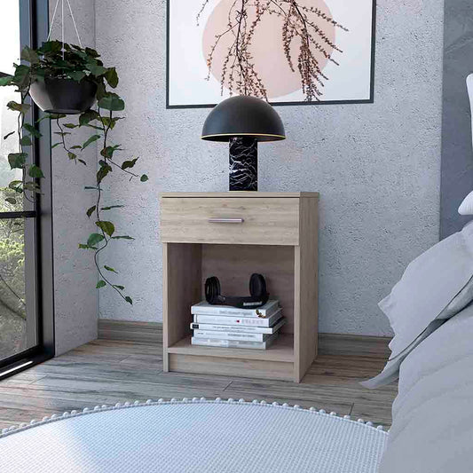Light wood bedside table with drawer open shelf and stacked books