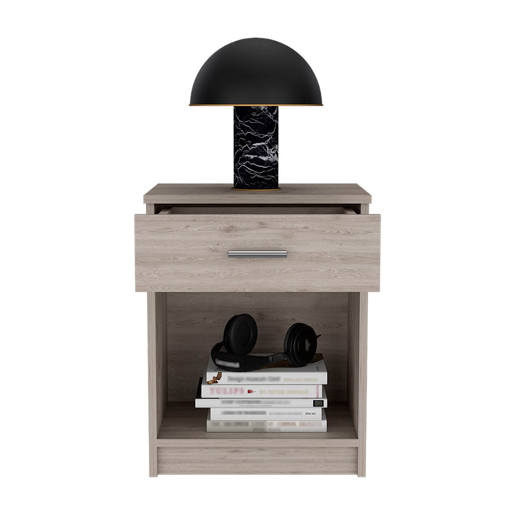 Light oak veneer nightstand with black marble lamp and open drawer