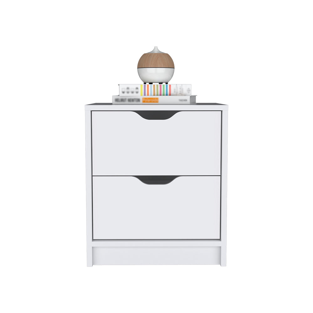 White twodrawer nightstand with modern cutout handles and stack of books