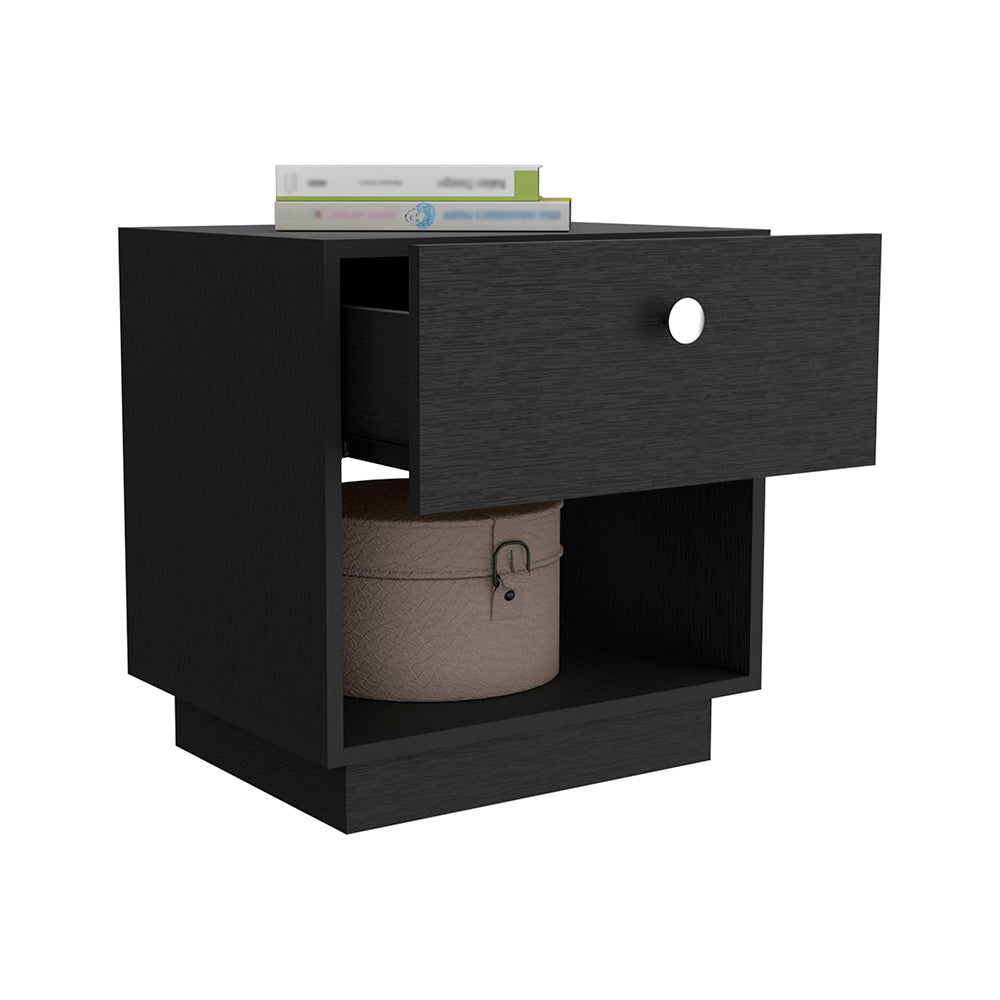 Black wood grain bedside table with one drawer and open shelf holding decorative box