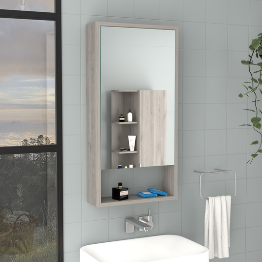 Gray wood medicine cabinet with mirrored door and open shelving displaying toiletries