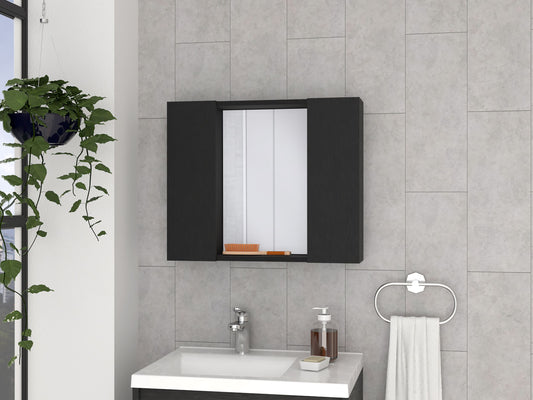 Modern black medicine cabinet with mirrored doors mounted above a bathroom sink
