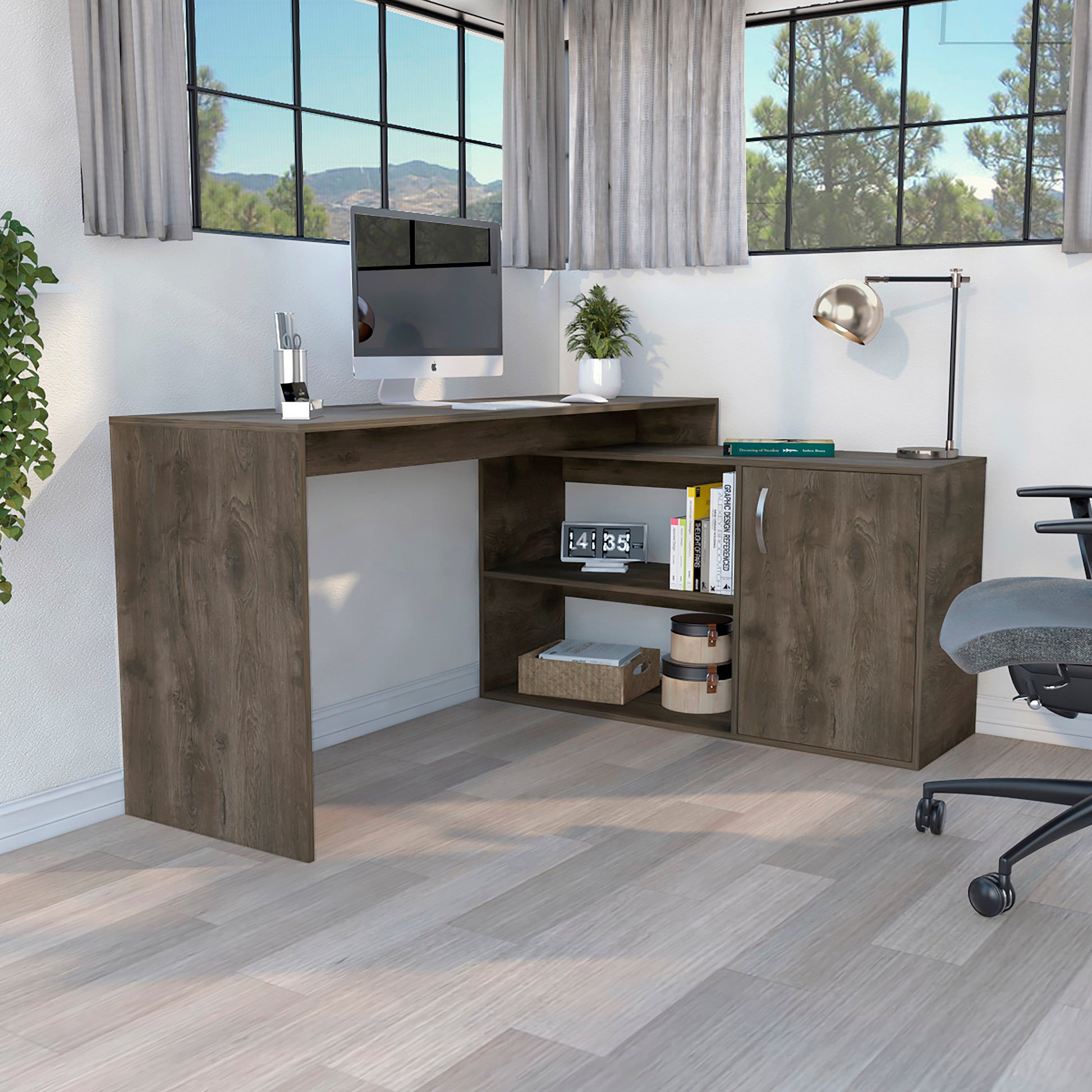 Lshaped corner desk in a dark wood finish with builtin shelving and cabinet for an organized home office