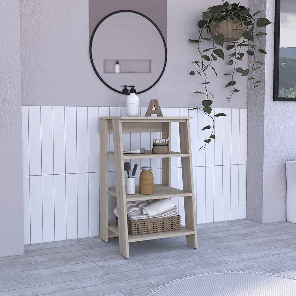 Light oak wood ladder shelf with three shelves holding bathroom essentials
