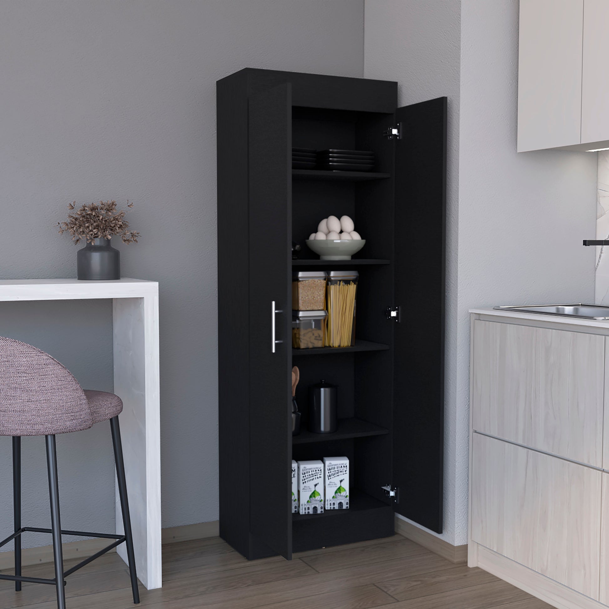 Tall black pantry cabinet with silver handles open doors revealing shelves with food and dishes