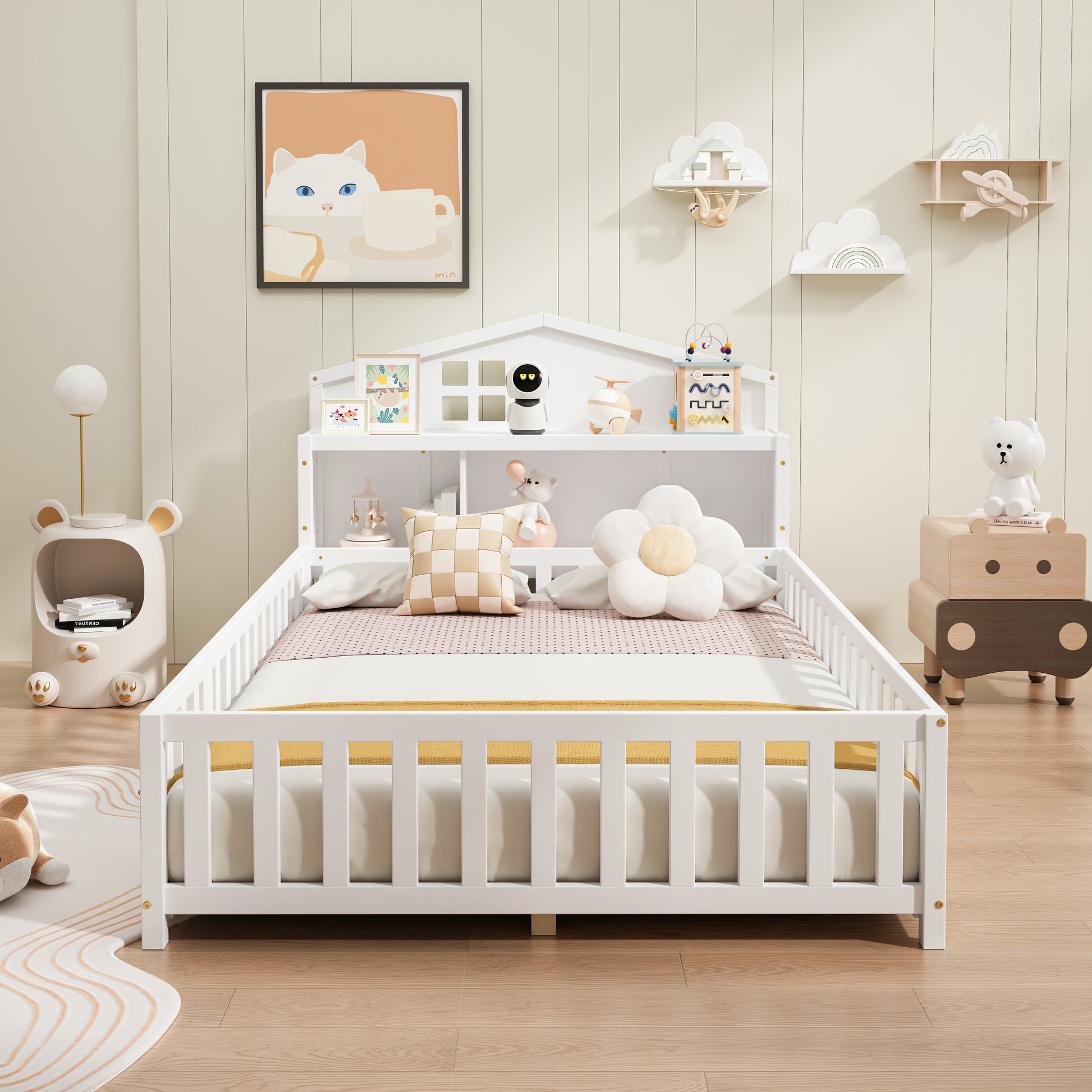White wooden toddler bed with integrated bookshelf and cloudshaped shelves
