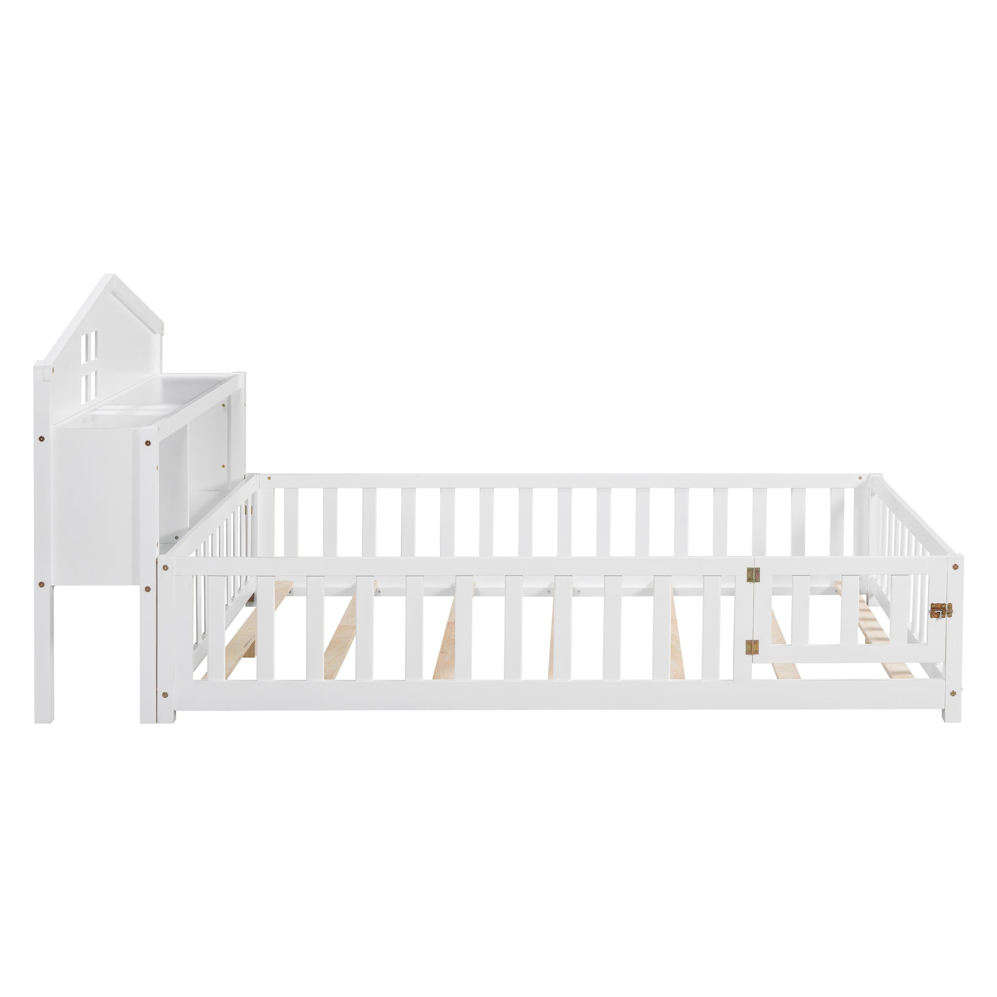 White wooden toddler bed with houseshaped headboard and safety rails