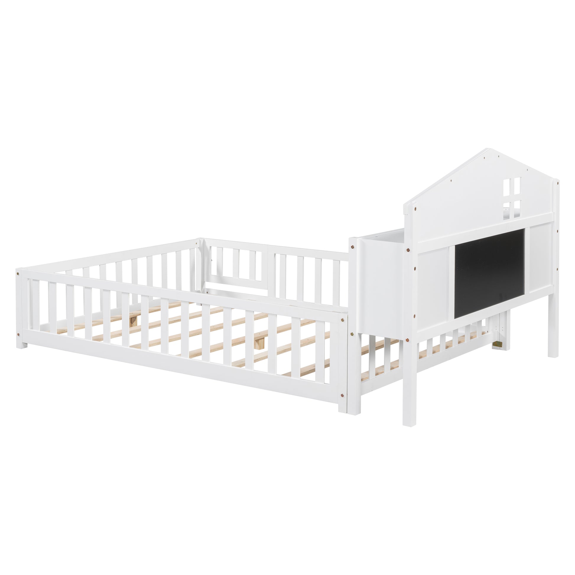 White wooden toddler bed with railings and houseshaped headboard with chalkboard