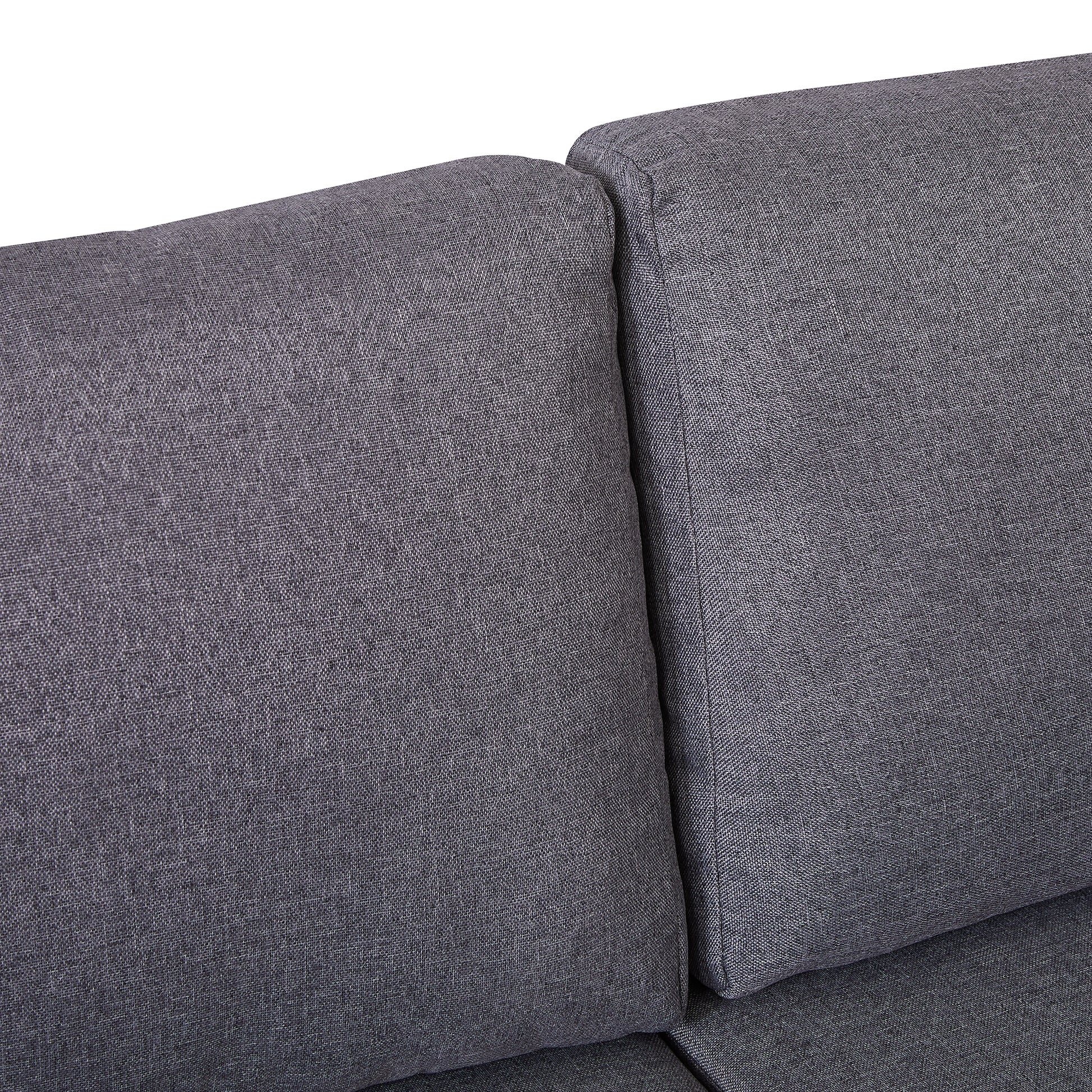 Closeup of dark gray fabric sofa cushions