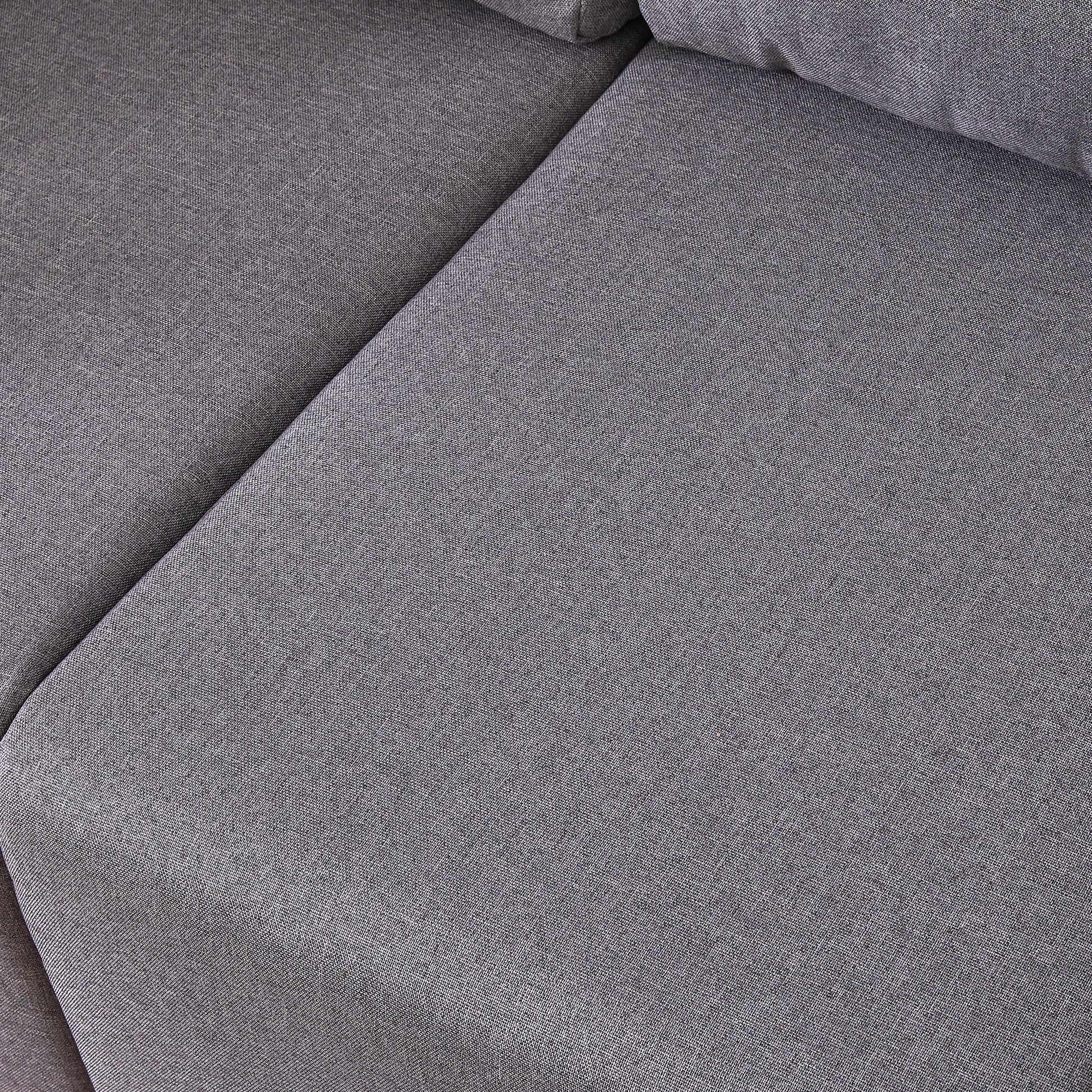 Closeup of dark grey textured fabric upholstery